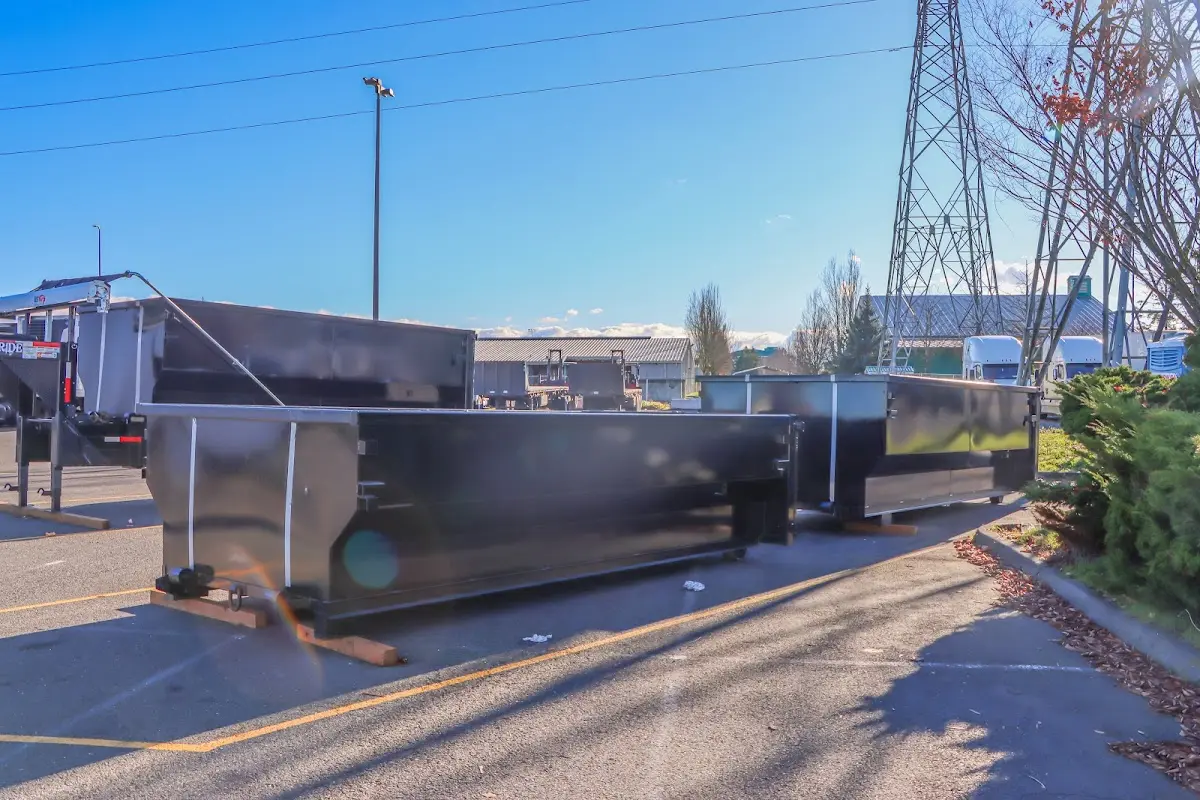 Roll-off dumpster ready for waste disposal at job site for Concrete Dumpster Rental in Lake Lorraine